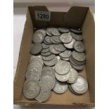 Approximately 1100 grams of pre 1947 silver half crowns.