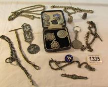 A mixed lot of watch fobs and watch chains.