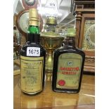 A Bottle of Wimbledon commemorative port and a bottle of Amoretto Aurella.