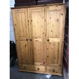 A pine 3 door 2 drawer wardrobe