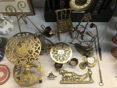 A quantity of brass ware including trivets and picture stands etc.