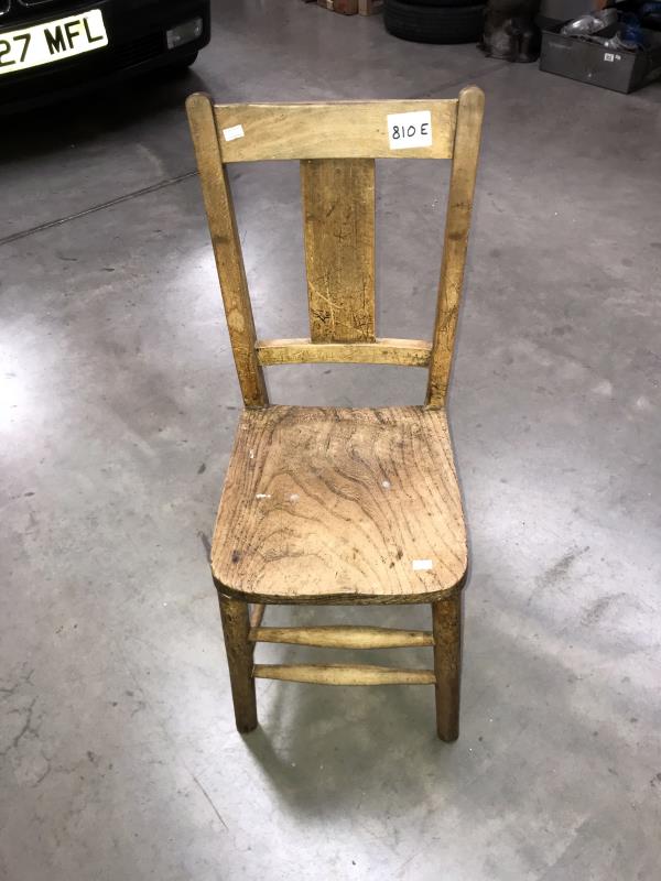 A wooden school chair