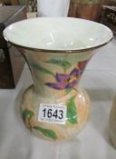 A Royal Doulton vase.