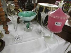 An art glass dish, a vaseline glass lidded pot and a pair of glass vases.