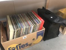 A box of LP records and a quantity of 78's