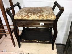 An Edwardian piano stool