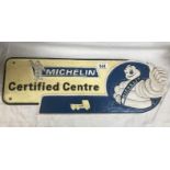A cast iron Michelin certified centre sign stamped 1949 Manchester on rear