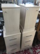 A pair of beech effect bedside chest of drawers and a pair of cupboards