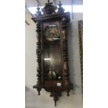 A Victorian mahogany vienna wall clock