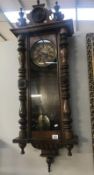 A Victorian mahogany vienna wall clock