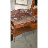 An old French marble top wash stand.