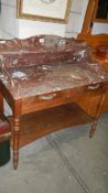 An old French marble top wash stand.