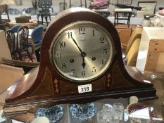 An inlaid Edwardian mahogany mantle clock with silvered dial by Hy Lee & Sons,