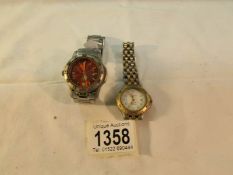 A Tag Heuer wristwatch and an Adidas adventure watch.