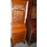 A good quality modern slim inlaid bureau bookcase.