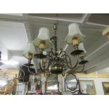 A brass 6 lamp ceiling light.