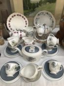 A 21 piece Susie Cooper tea set & 2 other Port tea sets