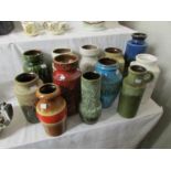12 German pottery vases of various styles.