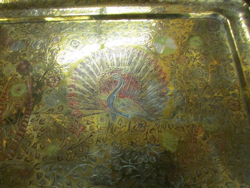 An Indian brass tray engraved with peacocks. - Image 2 of 2