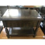 An oak sewing work table and contents including cottons etc.