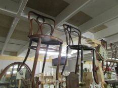 3 bentwood chairs.