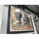 A framed print of elephants