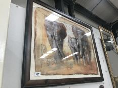 A framed print of elephants