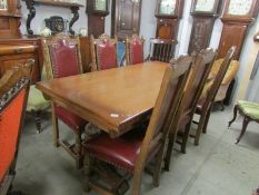 A good quality oak extending dining table and 6 chairs.