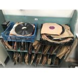 A large collection of 78 rpm records on record storage shelves.