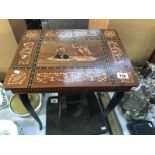 A 1950's Italian inlaid musical table