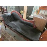 A mahogany chaise longue in need of re-upholstery.