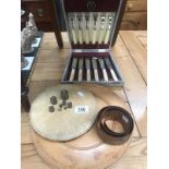 A cased set fish cutlery, brass weights,