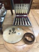 A cased set fish cutlery, brass weights,