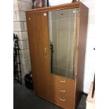 A 1 door 3 drawer mirrored wardrobe