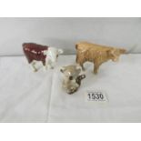 A Beswick highland calf, a Beswick Herefordshire calf and a Beswick koala.