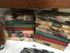 A collection of Enid Blyton books including Famous Five some early editions