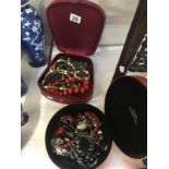 2 small vanity cases of costume jewellery