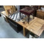 A large extending draw leaf oak dining table