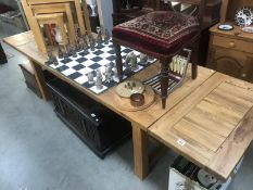 A large extending draw leaf oak dining table