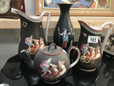 4 Roman esc patterned jugs,