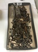A large quantity of old keys and 2 old scent bottles