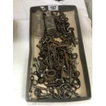 A large quantity of old keys and 2 old scent bottles
