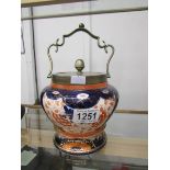 A Victorian Imari pattern biscuit barrel.