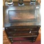 A 1950's oak bureau