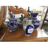 A blue pottery teapot and 2 vases.