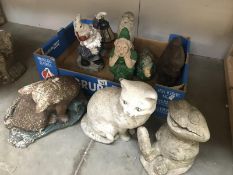 A quantity of mainly painted cement garden ornaments