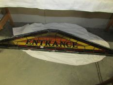A stained and leaded glass 'Entrance' sign,