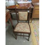 A mahogany inlaid chair with tapestry seat.