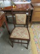 A mahogany inlaid chair with tapestry seat.