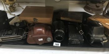 A quantity of vintage cameras, printing blocks etc.